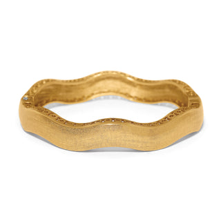 Brighton gold wavy hinged bangle bracelet with brushed matte finish and engraved edges