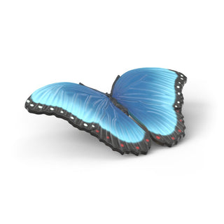 Schleich blue morpho butterfly figurine with black wing edges and red spots