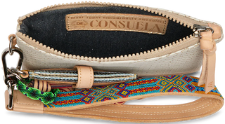 Open handbag showing interior with 'Consuela' brand label and colorful strap.