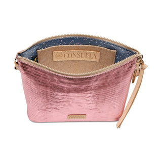Pink handbag with visible 'Consuela' brand 