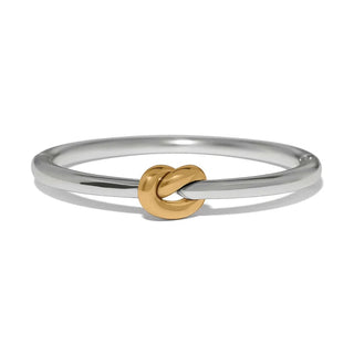 Brighton Interlok silver gold hinged bangle with single knot motif close-up