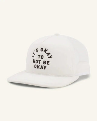 White snapback hat with embroidered text It's Okay To Not Be Okay