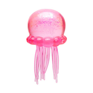 Pink glittery jellyfish-shaped Needoh squishy toy with tentacles and bubble rim
