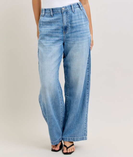 light wash blue jeans with elastic band plus button and belt loops.  Casual fit
