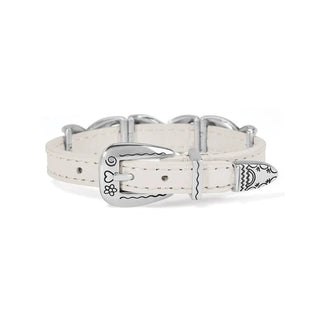 Silver buckle closure on white leather band featuring engraved floral heart swirl motifs and adjustable holes