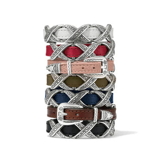 Stack of multicolor women's leather bracelets with silver crisscross chains and engraved buckle closures