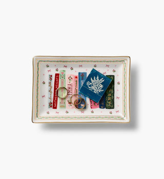Rifle Paper Co. porcelain catchall tray featuring classic literature book spines with gold trim border