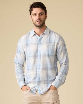 Man wearing Flag and Anthem Ladonia long sleeve plaid shirt in light blue and cream