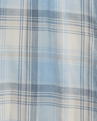 Close-up detail of blue, white, tan, and navy plaid woven fabric texture for men's shirt