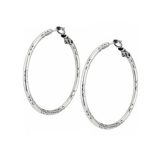 Brighton silver hoop earrings with decorative heart pattern engraving on white background