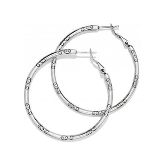 Brighton silver hoop earrings with decorative scroll pattern details on white background