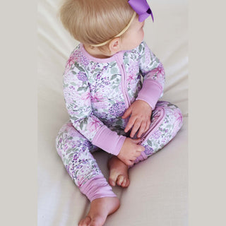 Toddler side profile convertible zipper open lavender floral romper hip and thigh fit