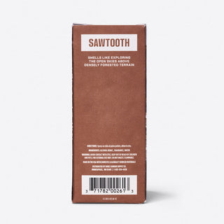 Back of Duke Cannon Sawtooth cologne box showing ingredients, directions, and barcode on brown packaging.