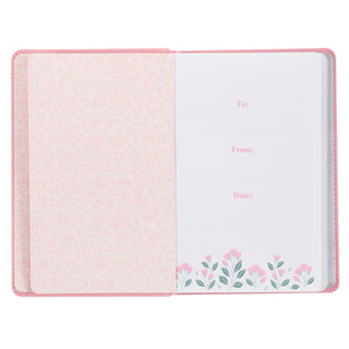 Inside front cover of pink devotional with gift fields and floral endpapers