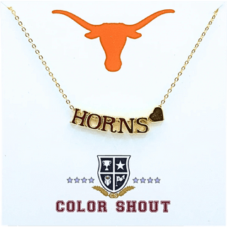 Gold necklace with 'Horns' pendant on a white package with Texas Longhorn logo.