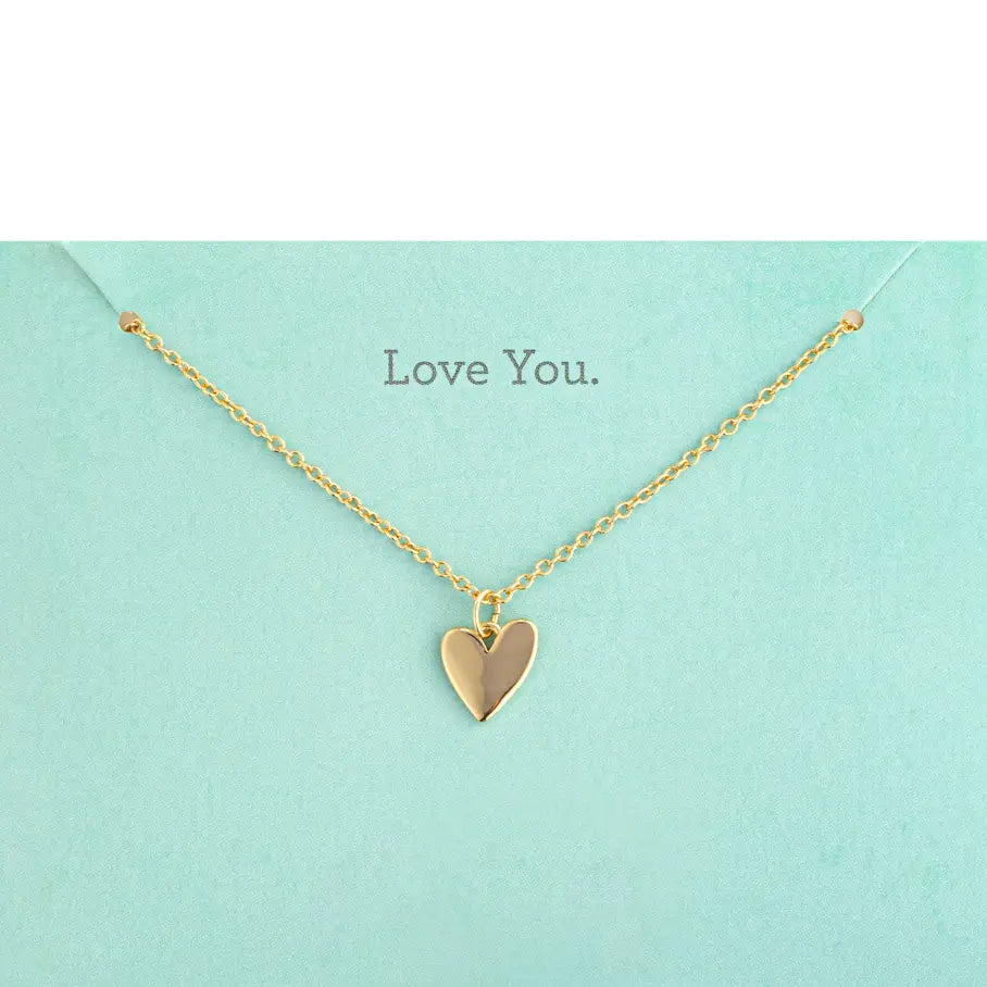 Gold heart-shaped necklace on a light blue card with 'Love You' text