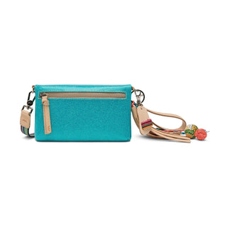 Turquoise handbag with a colorful strap 