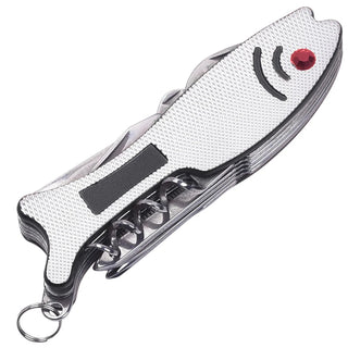 Closed silver fish multi-tool with textured body and black grip strip highlighting compact folded design for pockets