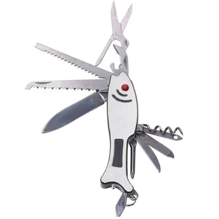 Compact silver fish-shaped pocket tool fanned open displaying serrated saws scissors and file on white background