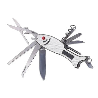 Silver stainless steel fish multi-tool with red eye fully deployed showing saw blade corkscrew and bottle opener