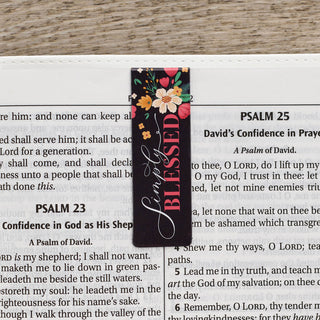 Simply Blessed floral magnetic bookmark placed in an open Bible at Psalms.