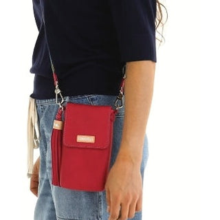 Red crossbody bag worn by a person 