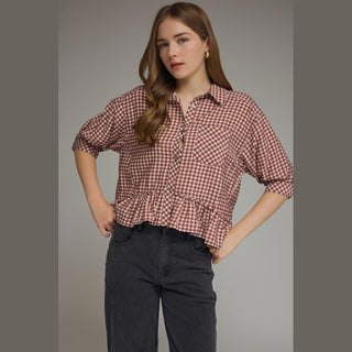 Front medium shot of maroon gingham blouse featuring button closure and rolled sleeves