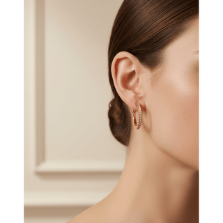 Meridian Eclipse Small Gold Hoop Earrings close-up lifestyle photo