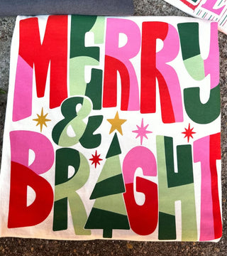 Small Town Society Merry & Bright white tee with bold colorful Christmas typography