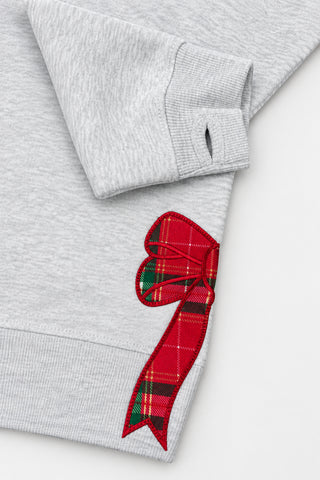 Gray heather fleece sweatshirt with red tartan plaid bow appliqué on sleeve