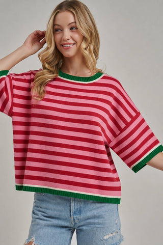 Pink and red striped knit sweater top with green ribbed trim and short sleeves