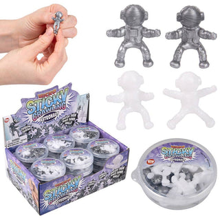 Micro Sticky Crawling Astronaut toys in silver and white with display box and container