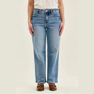 Front view of women's medium wash straight jeans with button fly and five pocket design