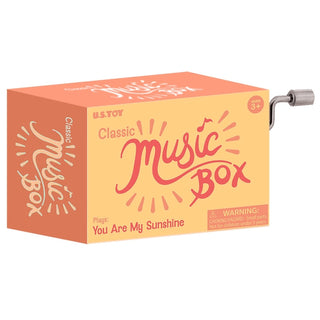 Peach-orange Classic Music Box package designed to play You Are My Sunshine