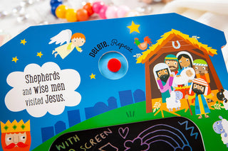 Blue hardcover Bible doodle book with LCD screen showing nativity scene and angel for ages 3+