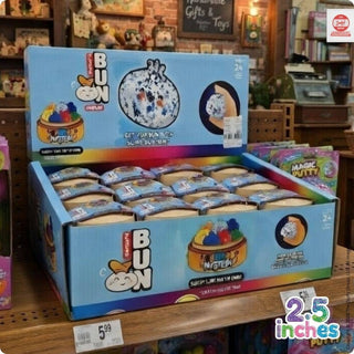 BUN Mystery Mogen retail display box of twelve sealed glitter dumpling squishy toys on store shelf