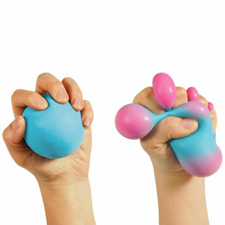 Blue and pink gradient Color Changing NeeDoh sensory ball being stretched by hands