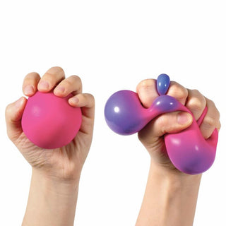 Purple to magenta gradient Color Changing NeeDoh dough-like toy being pulled apart