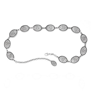 Brighton Nicole Concho Link Belt in silver with engraved floral oval medallions and lobster clasp