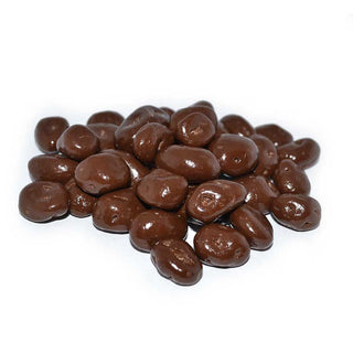 Pile of chocolate-covered raisins, glossy milk chocolate coating, no sugar added