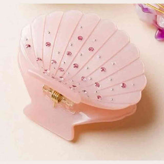 pink rhinestone seashell hair clip with gold hinge and faceted gem details