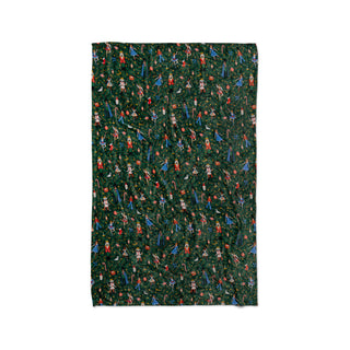Rifle Paper Co. Nutcracker fleece blanket with dark green background featuring ballet dancers and holiday motifs