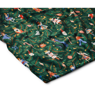 Rifle Paper Co. Nutcracker fleece blanket with colorful holiday characters on deep green background