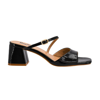 Black patent leather mule sandal side view showing Ooh La La label and textured glossy finish