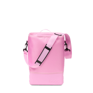 Bogg Original Half Brrr insulated cooler bag in bright pink with adjustable shoulder strap