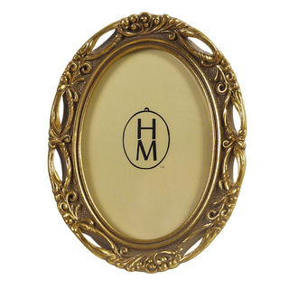 Ornate oval antique gold resin photo frame with scrollwork detail showing brand label inside