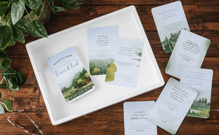 Max Lucado Peace and Rest Prayer Pass Along Notes cards displayed on white tray with greenery