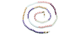 Peepers beaded eyeglass chain in bright multicolor beads arranged in a spiral pattern