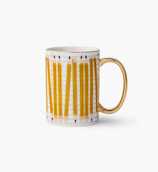Rifle Paper Co. white porcelain mug with yellow pencil pattern and gold handle