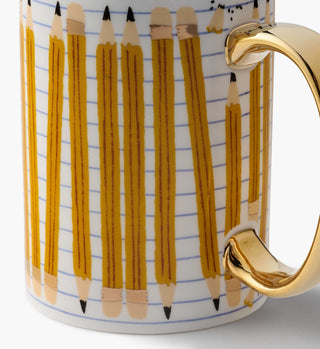 Close-up detail of Rifle Paper Co. Pencils Porcelain Mug showing pencil pattern and gold handle